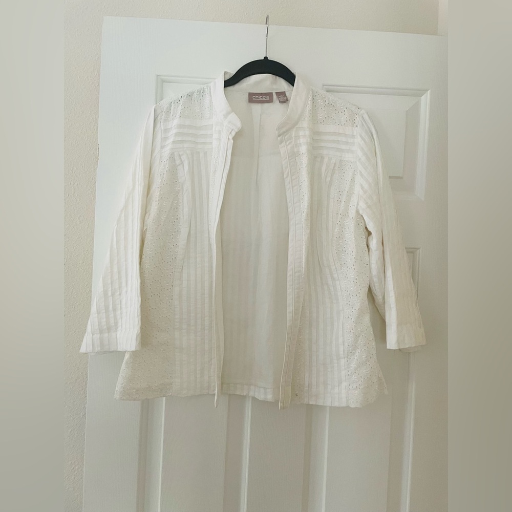 Chico’s fully line white eyelet jacket.